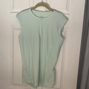 Athleta Light mint vented top. Medium GUC. 18’ ptp. Zip up pockets and front